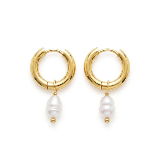 Artemis vandfaste guldøreringe på hvid baggrund