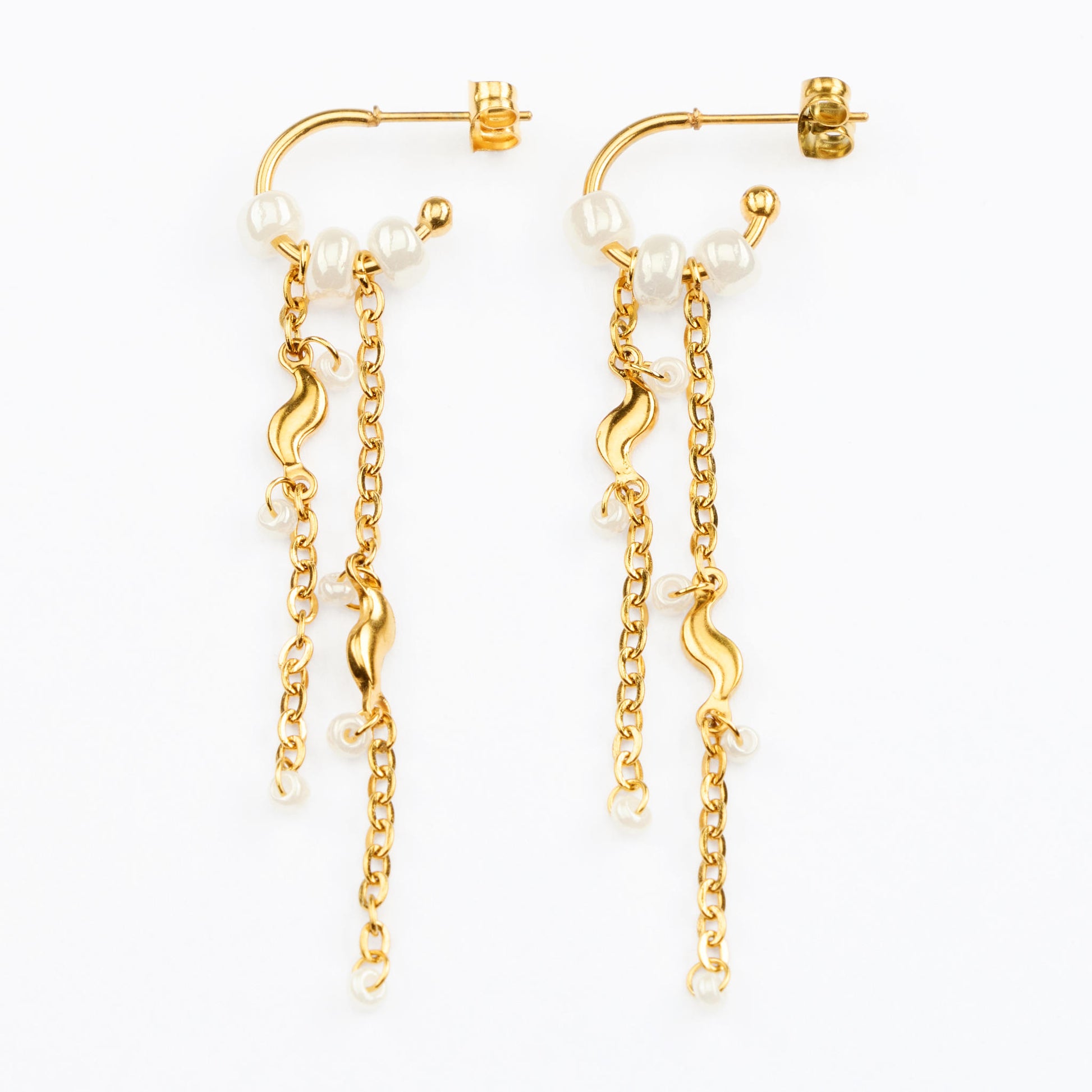 Telos vandfaste guldøreringe på lys baggrund